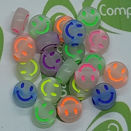 Dijes carita fluo surtidos x 100 gs